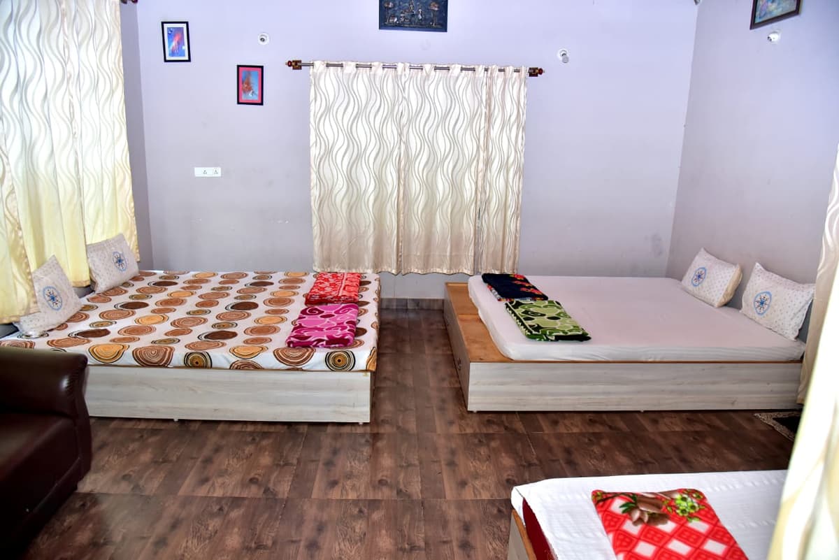 A cozy two-sharing room at the homestay