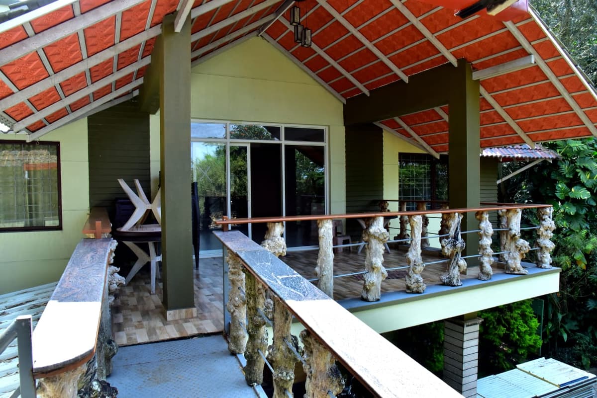 Side view of The Beehive property in a coffee estate